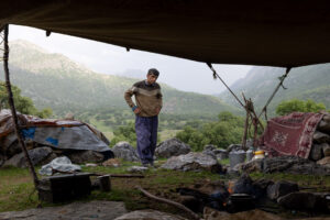 IRAN 2026 Abbas is always hungry as he uses up a lot more energy than the other nomads. He is impatiently waiting for his lunch.