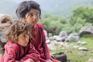 IRAN , 2026 Saba and her older sister, Sana are well behaved children and are silent while listening to the adult conversations.